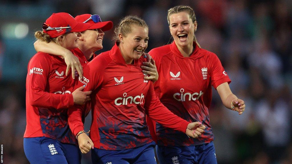 Sophie Ecclestone (middle) celebrates a wicket with Charlie Dean, Heather Knight and Lauren Bell