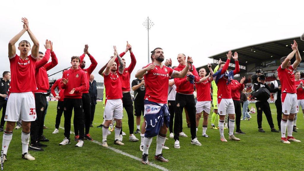 Wrexham players celebrate promotion