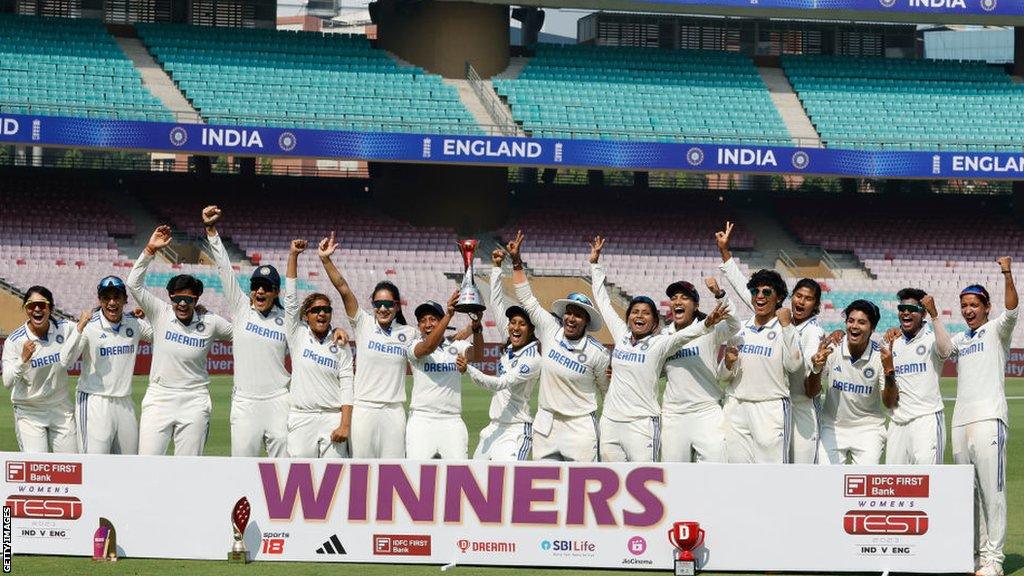 India celebrate with the Test series trophy