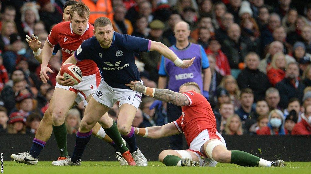 Scotland's Finn Russell is tackled by Ross Moriarty of Wales