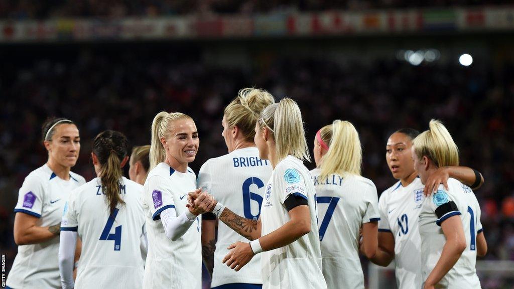 England women's players celebrate