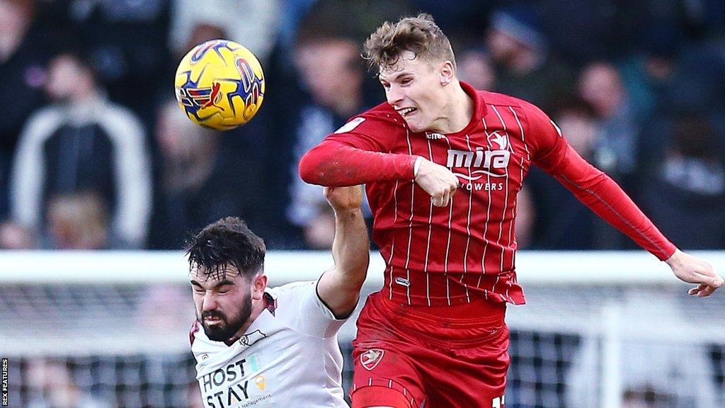 Cheltenham striker Rob Street (right) in action against Derby