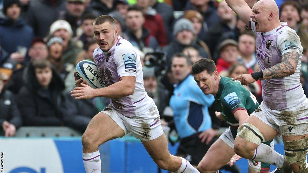 Ollie Sleightholme of Northampton Saints breaks clear to score a try against Leicester