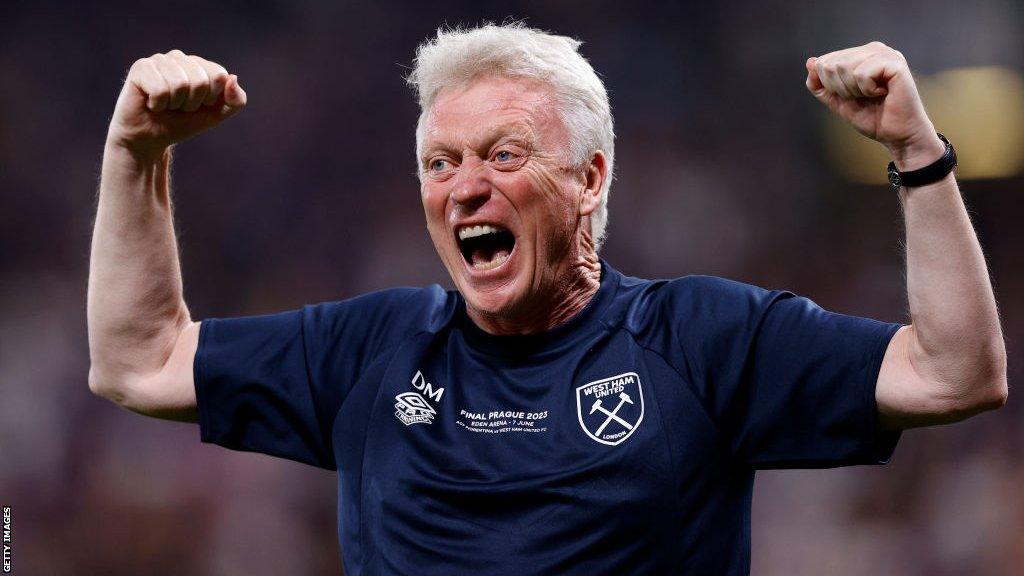 West Ham manager David Moyes raises his arms and shouts in delight