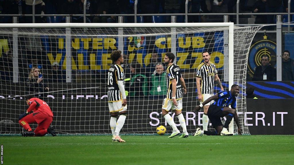 Juventus players look dejected after conceding an own goal at Inter Milan