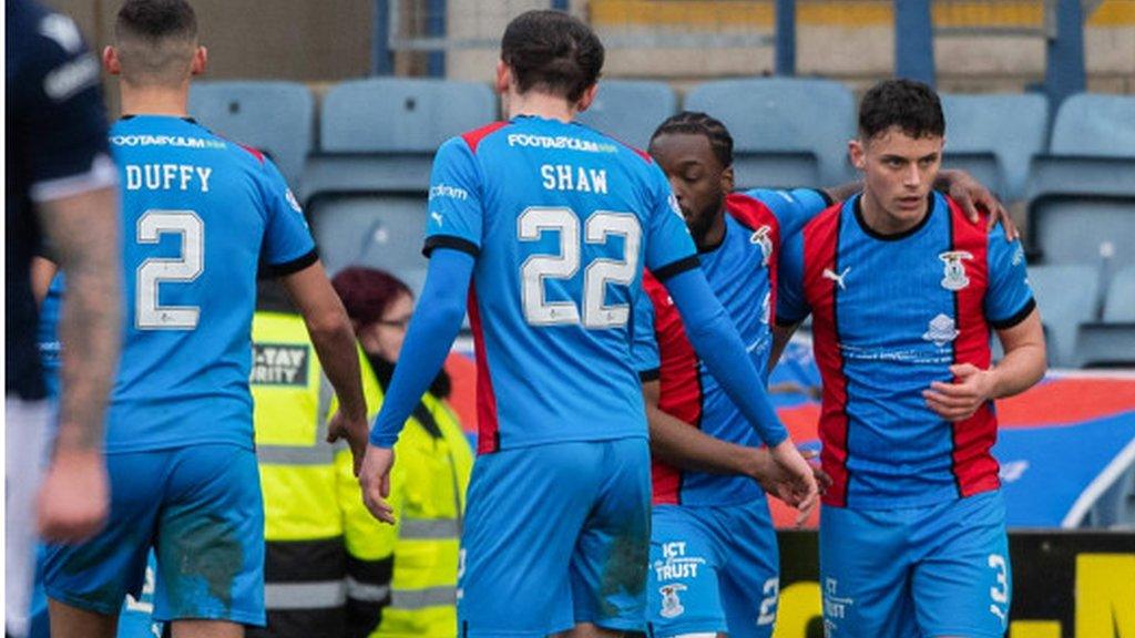 Inverness players celebrate