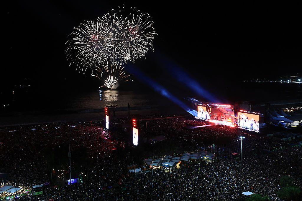 Fireworks light up the sky at a free Lady Gaga concert on Copacabana beach