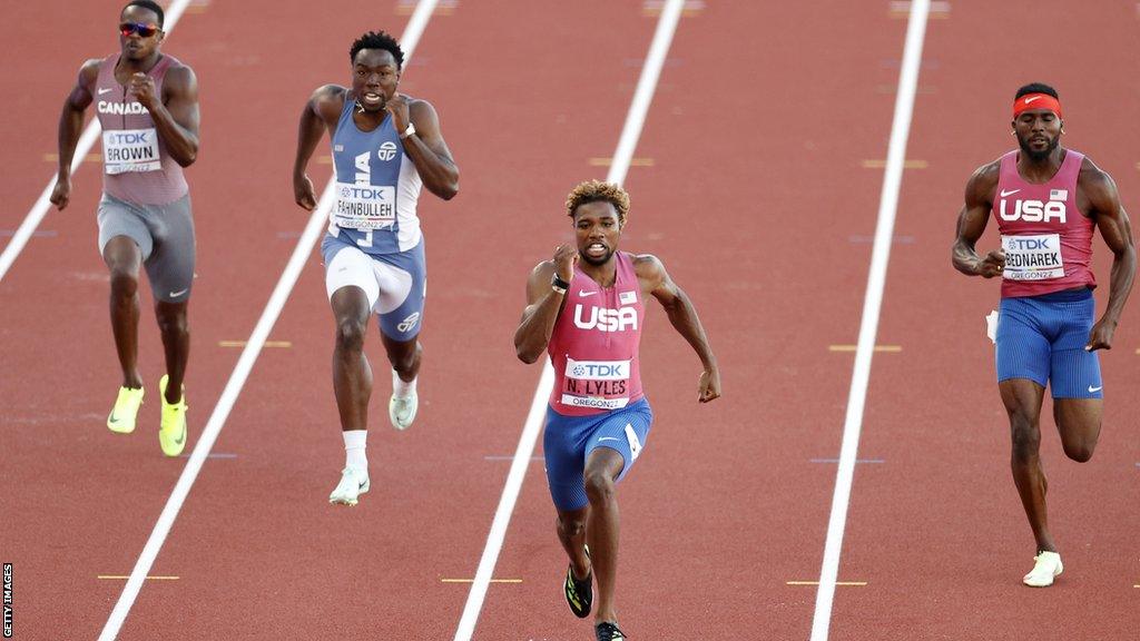 Jospeh Fahnbulleh (left) chases Noah Lyles