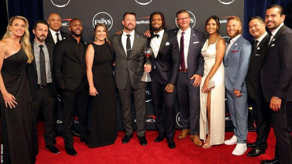 Damar Hamlin and the Buffalo Bills athletic training staff after receiving the Pat Tillman Service Award at the 2023 ESPY Awards