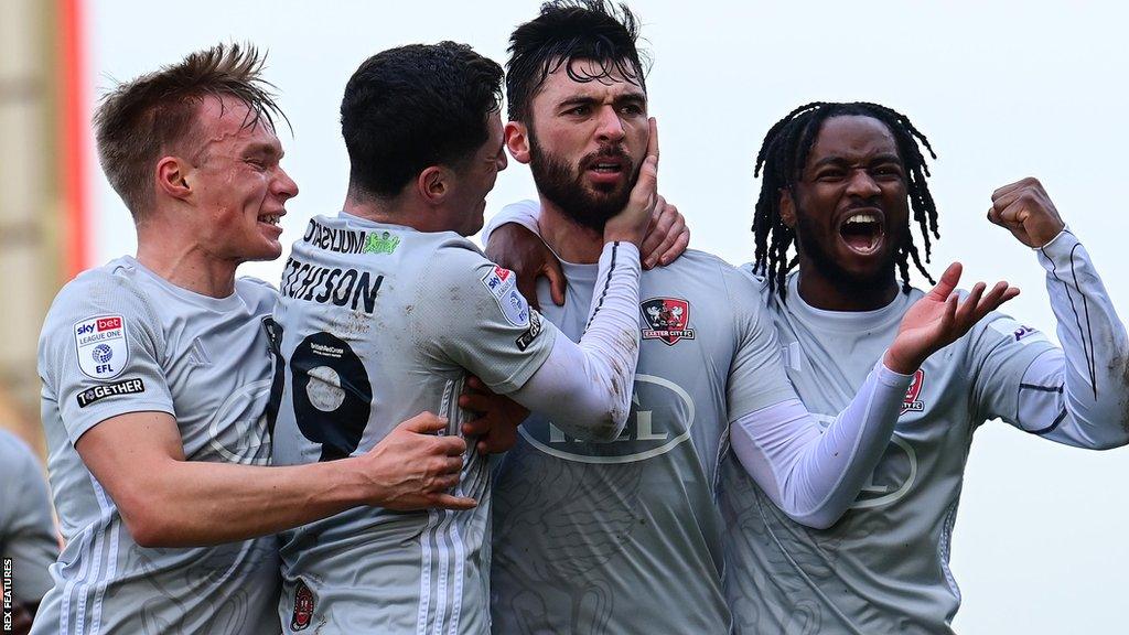 Exeter celebrate Reece Cole's goal