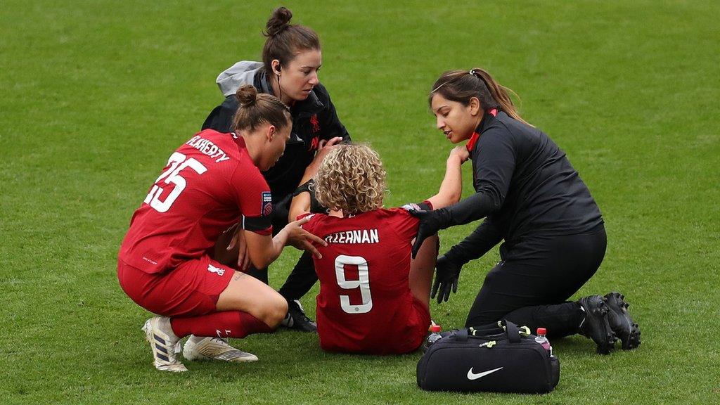 Liverpool's Leanne Kiernan is attended to by medical staff