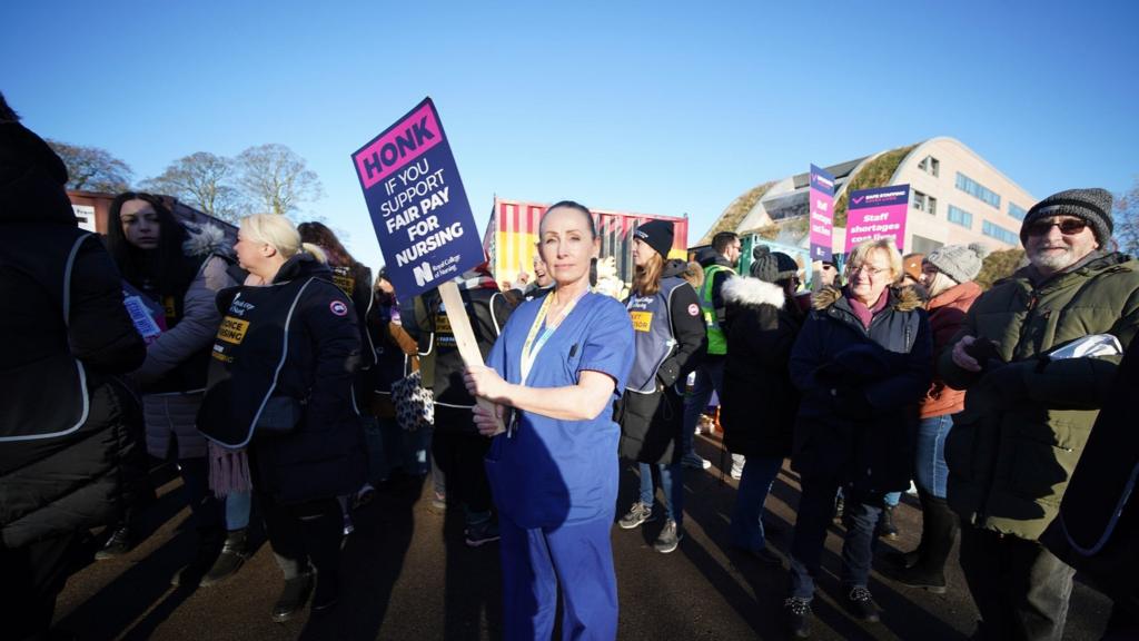 Members of the Royal College of Nursing on the picket line outside the Alder Hey Children's Hospital in Liverpool