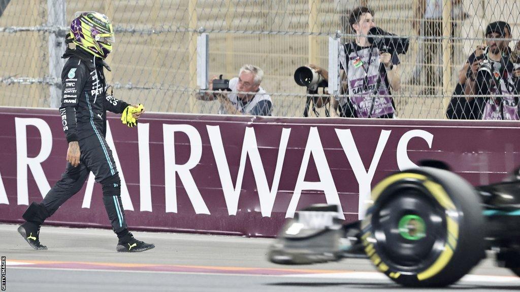 Lewis Hamilton on the track after his crash at the Qatar Grand Prix