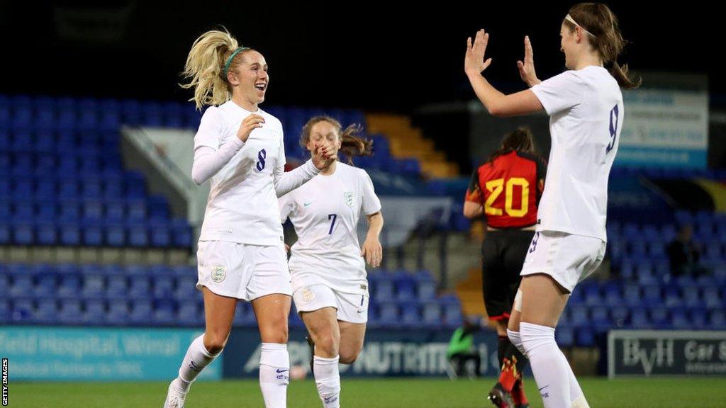 Missy Bo Kearns celebrates scoring against Belgium