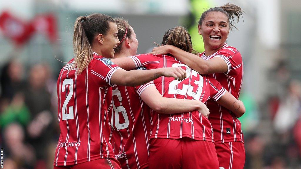 Abi Harrison (right) celebrates a goal with three of her Bristol City team-mates