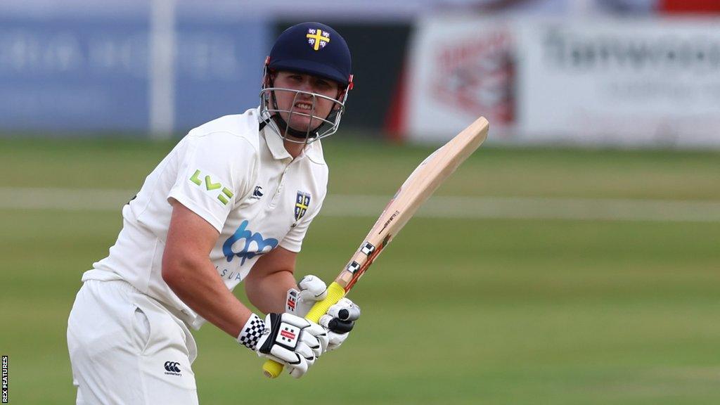 Durham batter Alex Lees celebrates reaching a century