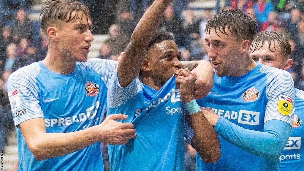 Sunderland's Jack Clarke, Amad Diallo and Dan Neil celebrate a goal against Preston