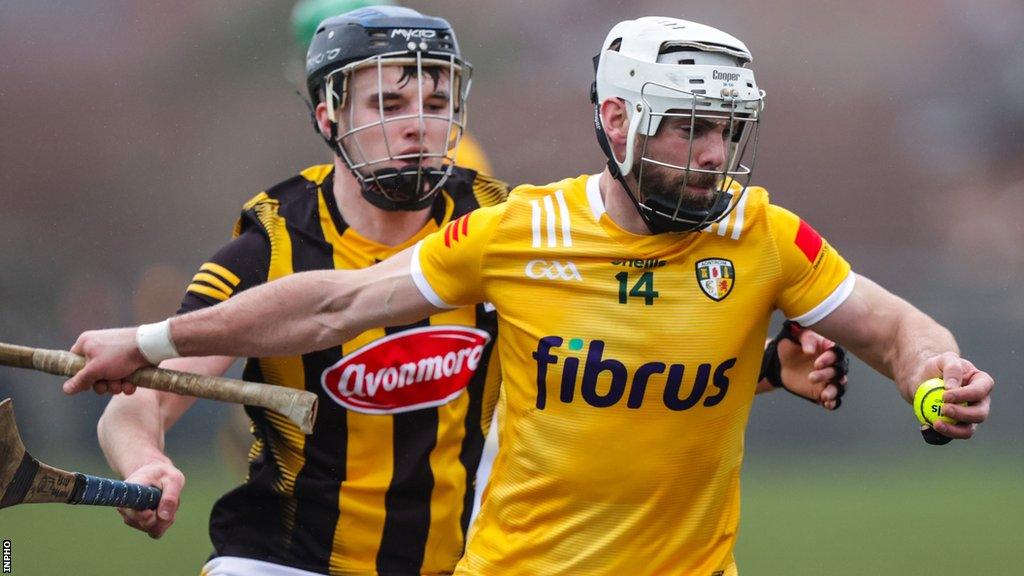 Neil McManus tries to burst away from Kilkenny's Billy Drennan during this year's Division One League contest at Corrigan Park