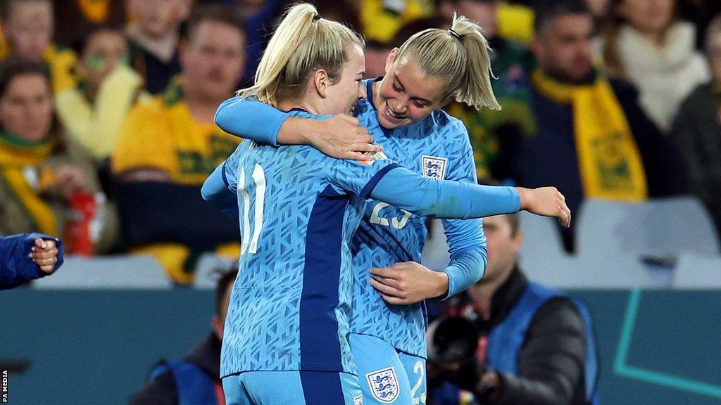 Lauren Hemp and Alessia Russo celebrate after beating Australia