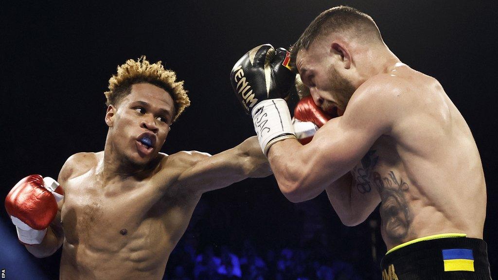 Devin Haney in action against Vasiliy Lomachenko