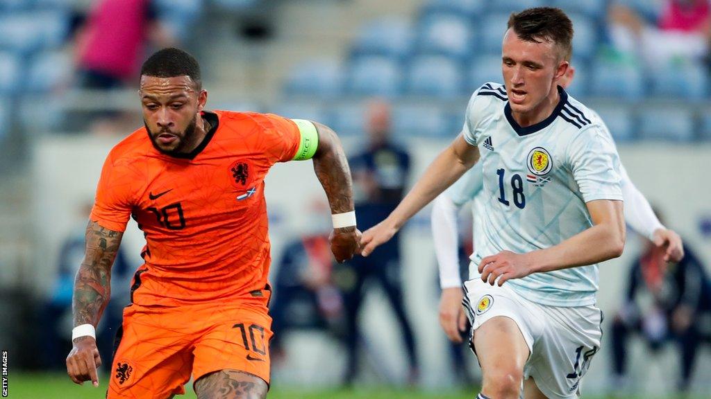 Netherlands forward Memphis Depay and Scotland midfielder David Turnbull