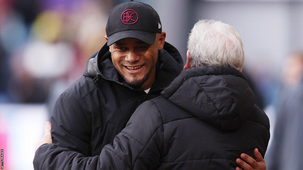 Vincent Kompany and Roy Hodgson