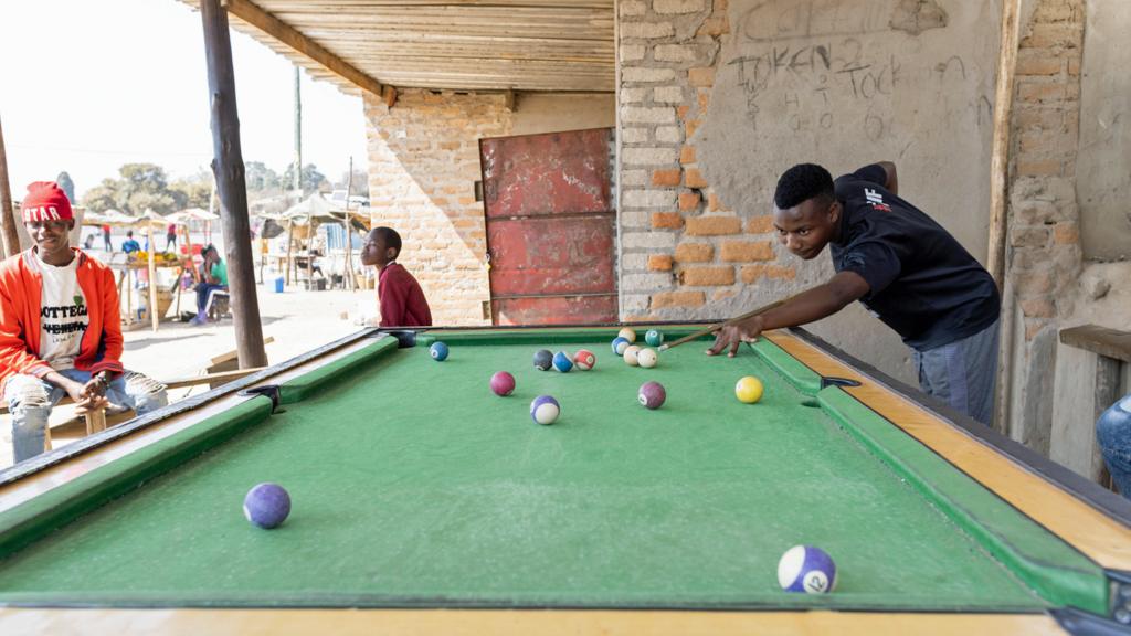 People playing pool in the Epworth suburb of Harare, Zimbabwe - August 2023