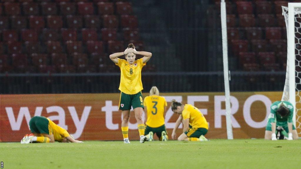 Wales players show their disappointment after World Cup play-off defeat in Switzerland in 2022