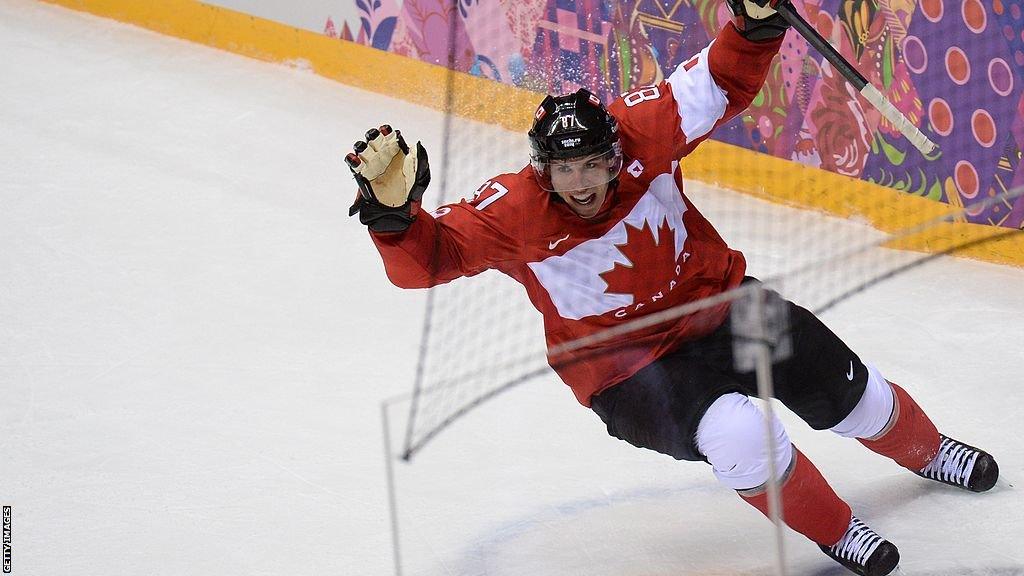 Sidney Crosby celebrates scoring in the 2014 Winter Olympics gold medal match