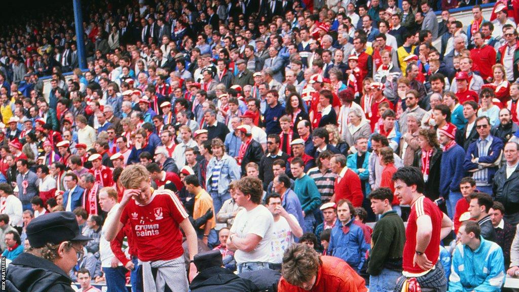 Nottingham Forest fans watch on at the opposite end to Leppings Lane at the 1989 FA Cup semi-final at Hillsborough