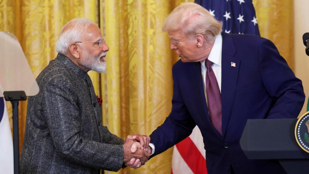 Trump and Modi shake hands