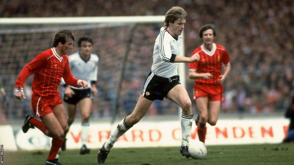 Gordon McQueen in action for Manchester United