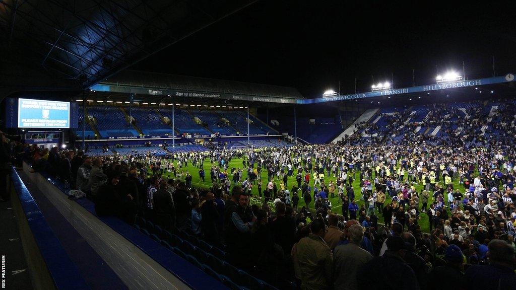 Fans flooded the pitch after Sheffield Wednesday beat Peterborough United on penalties to complete their stunning League One play-off semi-final second leg comeback