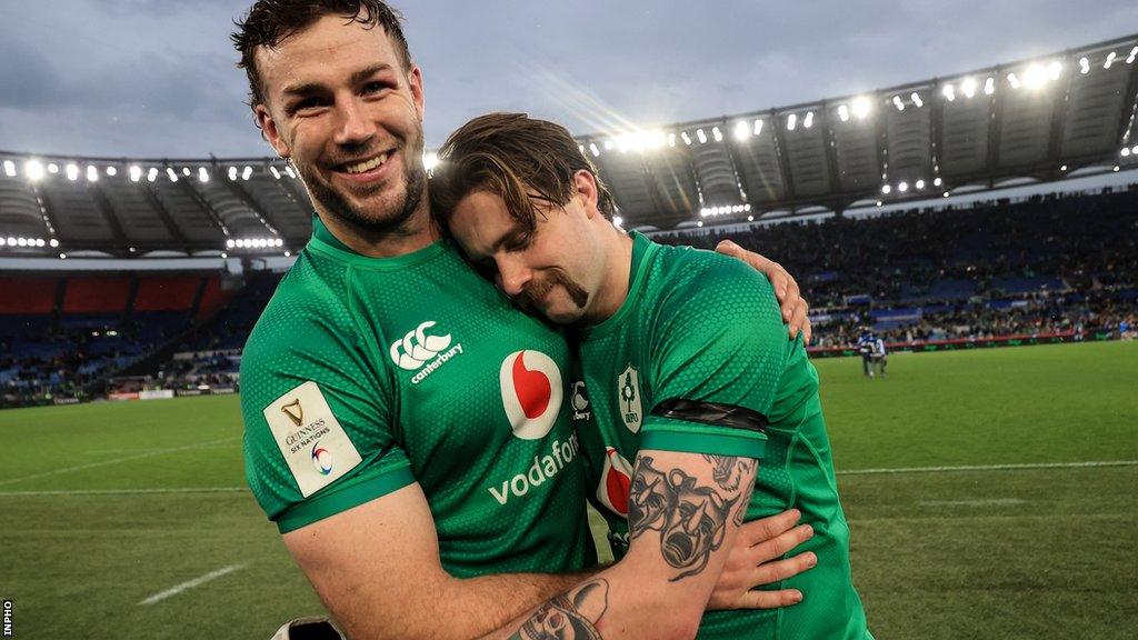 Mack Hansen and Caelan Doris embrace after Ireland's win in Rome two weeks ago