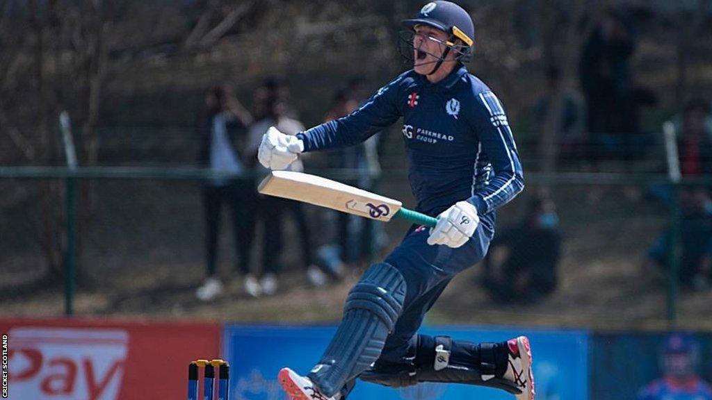 Michael Leask celebrates his maiden ODI century