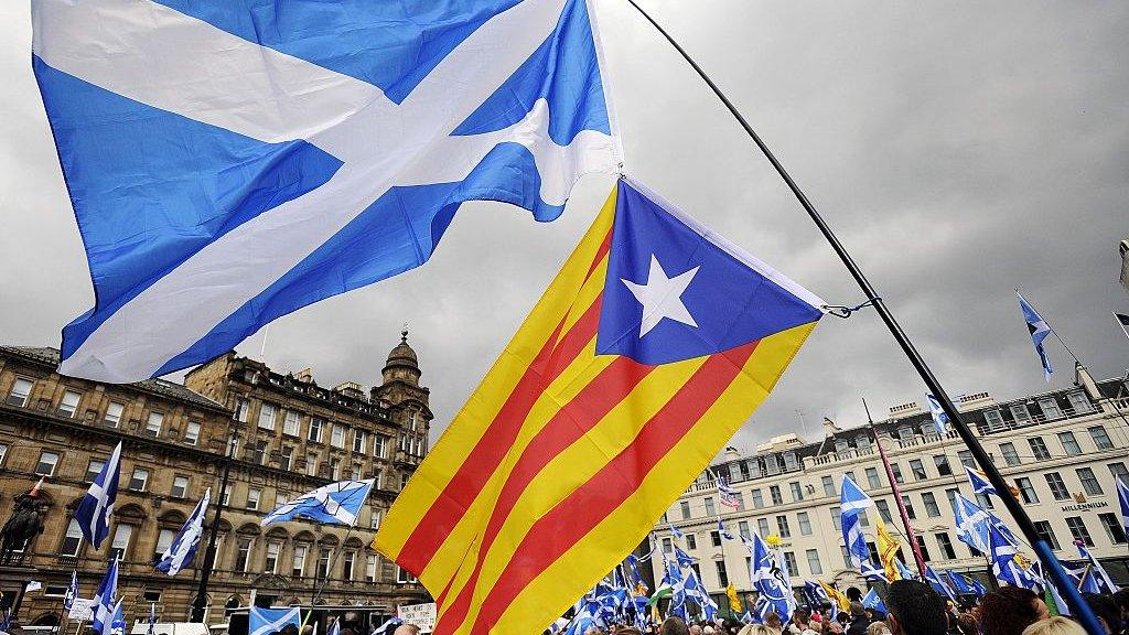 Scotland and Catalan flags