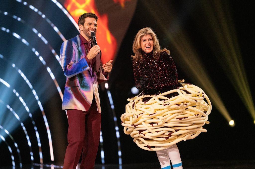 Kate Garraway in Spag Bol costume with Masked Singer presenterJoel Dommett.