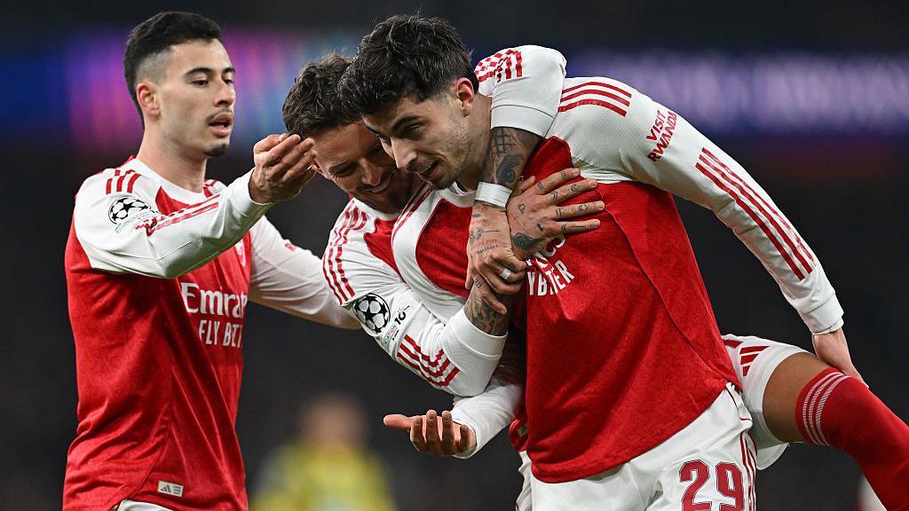 Arsenal players celebrate goal