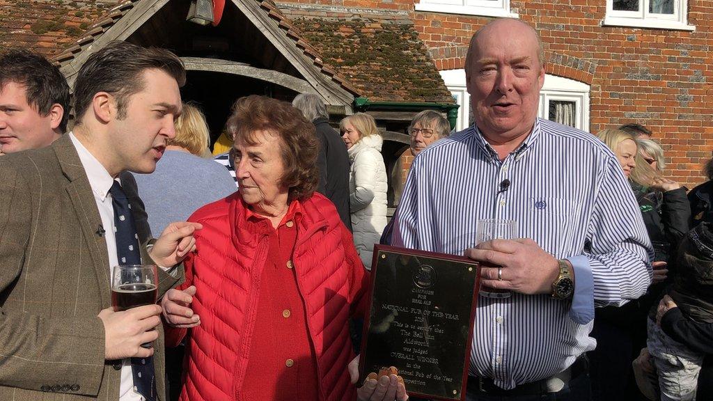 Hugh Macaulay (far right) has been celebrating his win along with his regulars