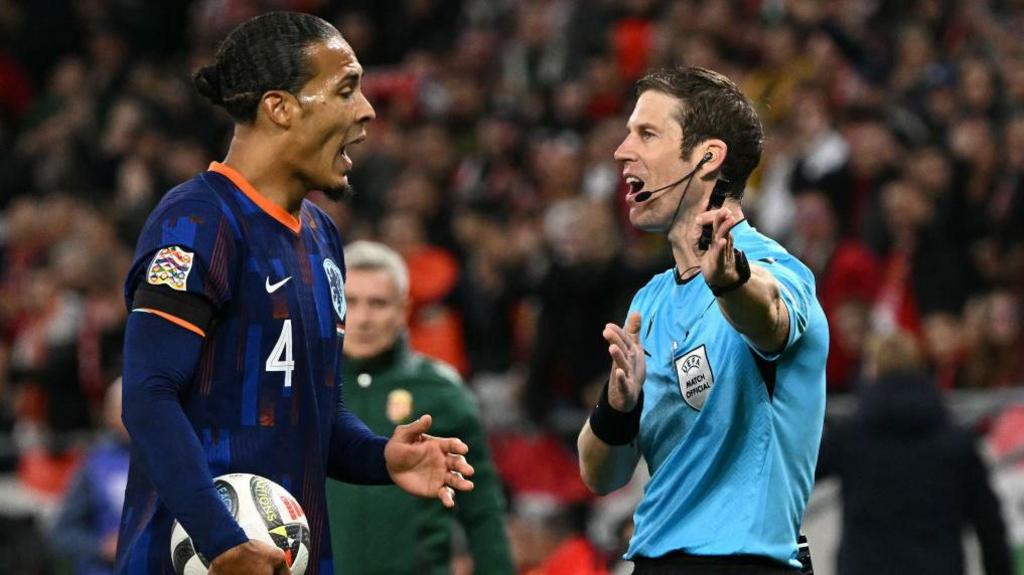 Virgil van Dijk and the match referee