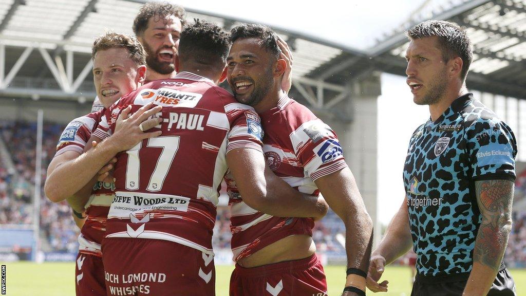 Wigan celebrate Bevan French's try in the first-half