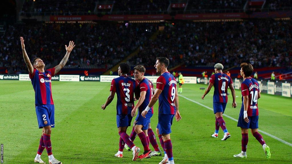 Barcelona celebrate after Joao Cancelo scores against Celta Vigo