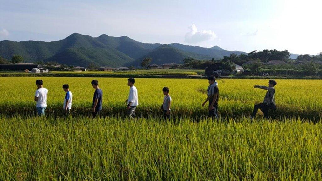 Kim's foster family in a field, South Korea