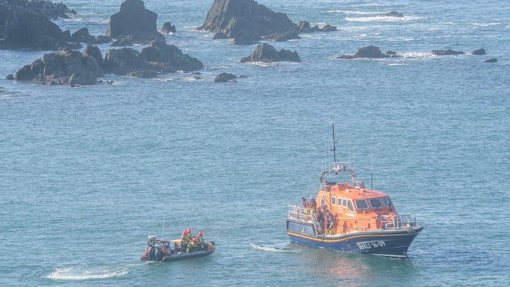 RNLI crews conducting a rescue off Bigbury