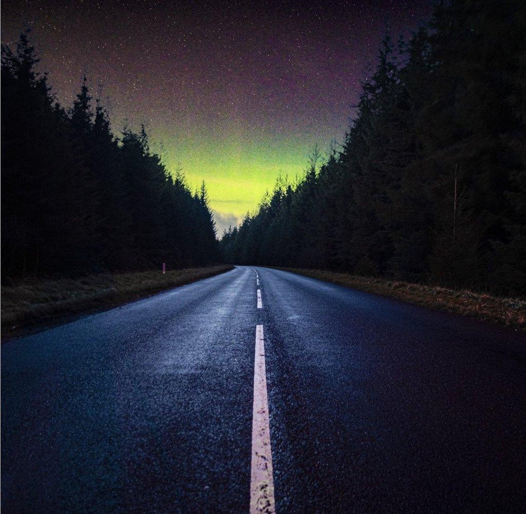 Northern Lights on a road Kielder