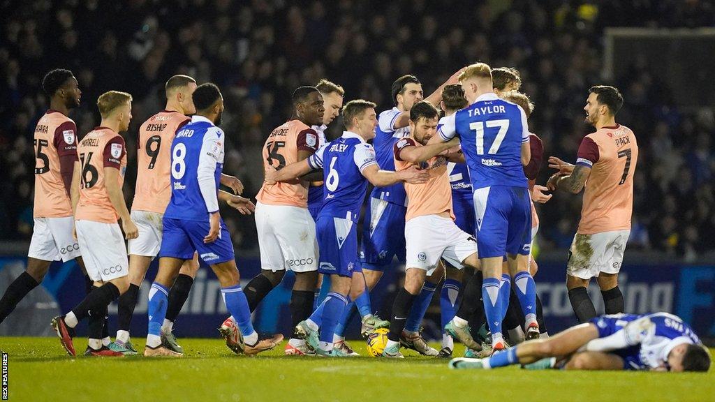 Bristol Rovers and Portsmouth players shoving