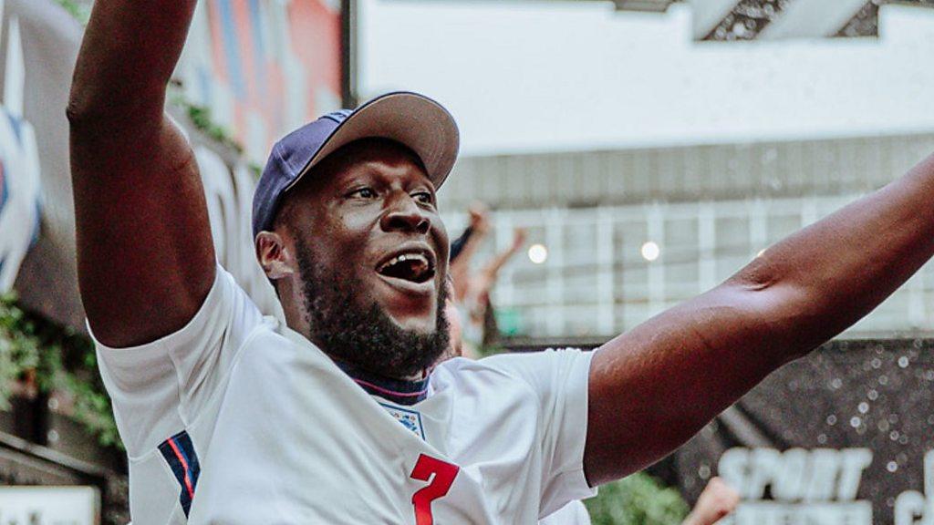 Stormzy celebrating at the England game