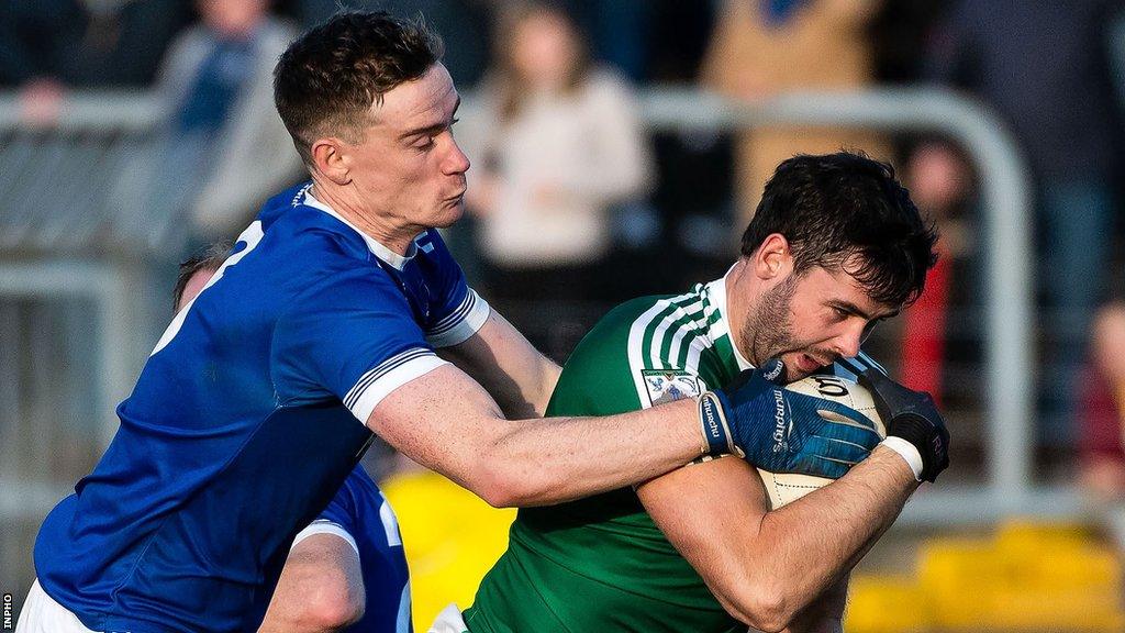 Naomh Conaill's Ciaran Thompson and Gaoth Dobhair's Odhran MacNiallais battle in the 2019 Donegal Football Final