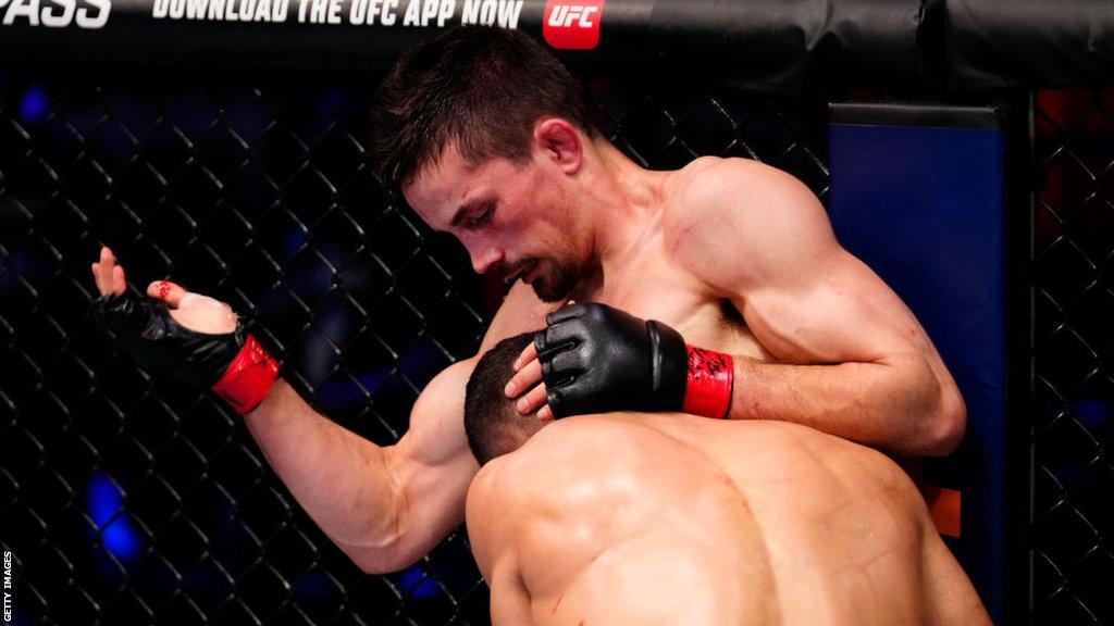 George Hardwick grapples with Abdul-Kareem Al-Selwady during their fight on Dana White's Contender Series.