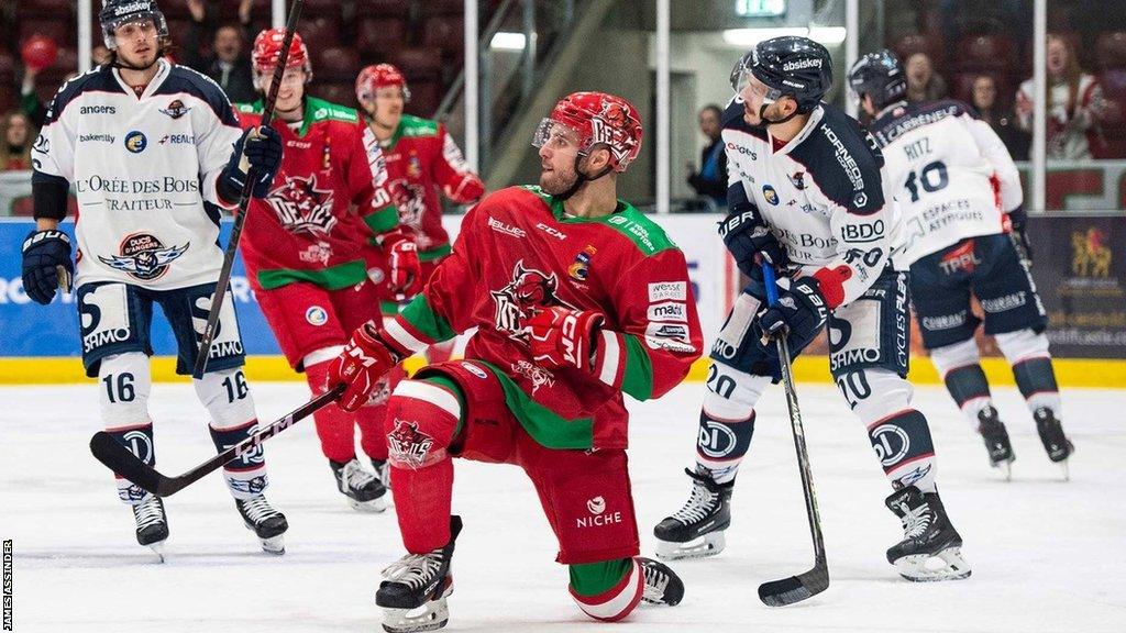 Ryan Penny celebrates one of his two goals